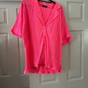 Dressed in lala short sleeve plisse set in electric pink.
